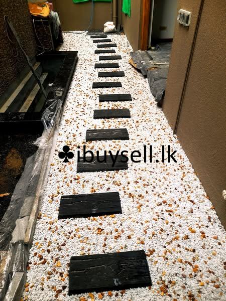 Inter lock Pawing and Malaysian Carpet Grass